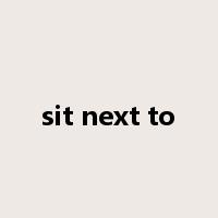 sit next to是什么意思