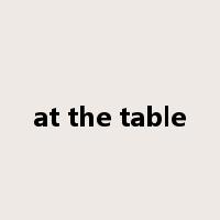 at the table是什么意思