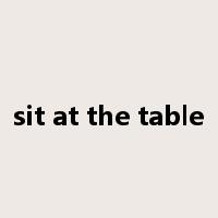 sit at the table是什么意思