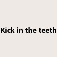 Kick in the teeth是什么意思